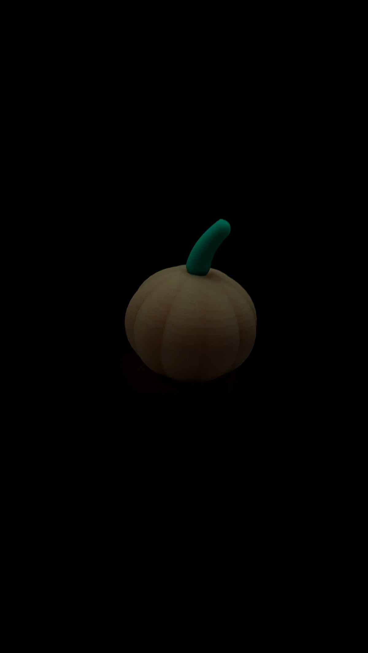 Glow in the dark pumpkin Halloween decoration, side view