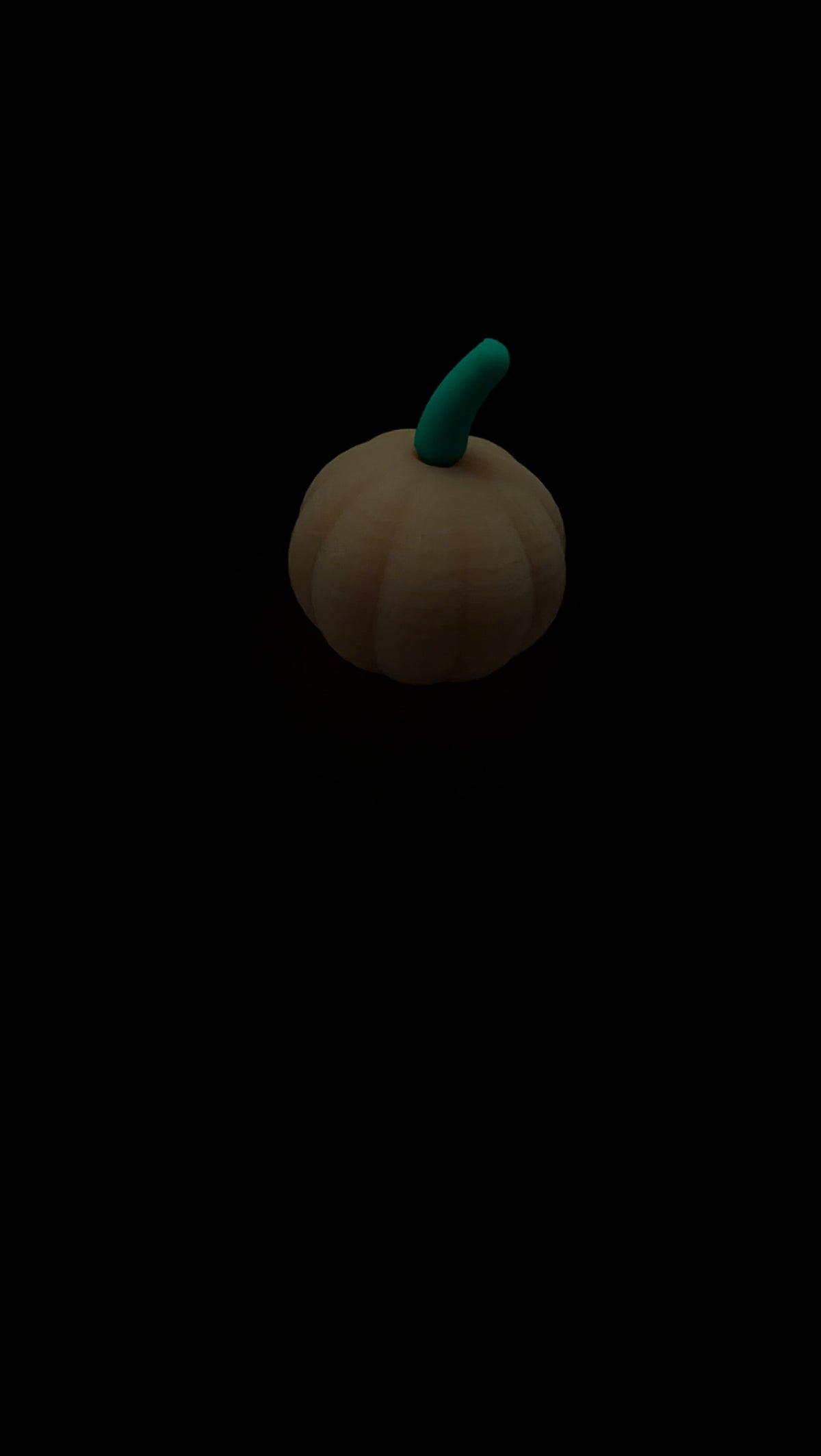 Glow in the dark pumpkin Halloween decoration on display